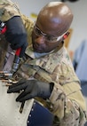 Tech. Sgt. Rodrick Hall, 919th Maintenance Squadron, replaces a broken piece of equipment off of a C-145 Skytruck at Duke Field, Fla., Feb. 25.  Hall is part of the 919th Special Operations Maintenance Group’s fabrication shop.  (U.S. Air Force photo/Tech. Sgt. Sam King)  