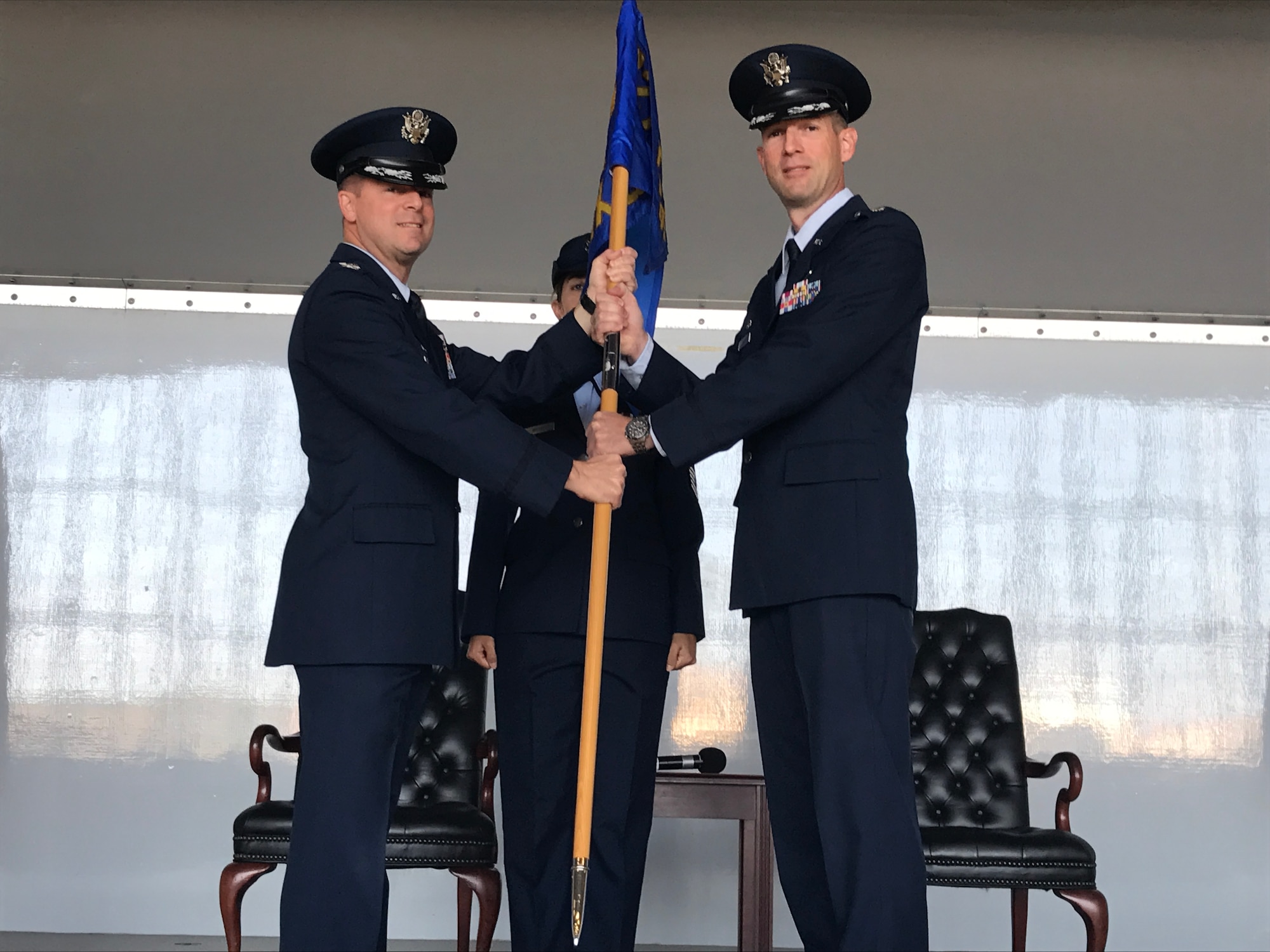 U.S. Air Force Lt. Col. Kristofer “Scot” Terry, incoming 927th Maintenance Group commander, accepts the guidon from Col. Frank Amodeo, 927th Air Refueling Wing commander, during the assumption of command ceremony Dec. 3, 2016, at MacDill Air Force Base, FL. Terry assumed command of the 927th Maintenance Group after serving at Air Force Reserve Headquarters as chief of the Aircraft Maintenance Management Branch. (U.S. Air Force photo by Senior Airman Xavier Lockley)