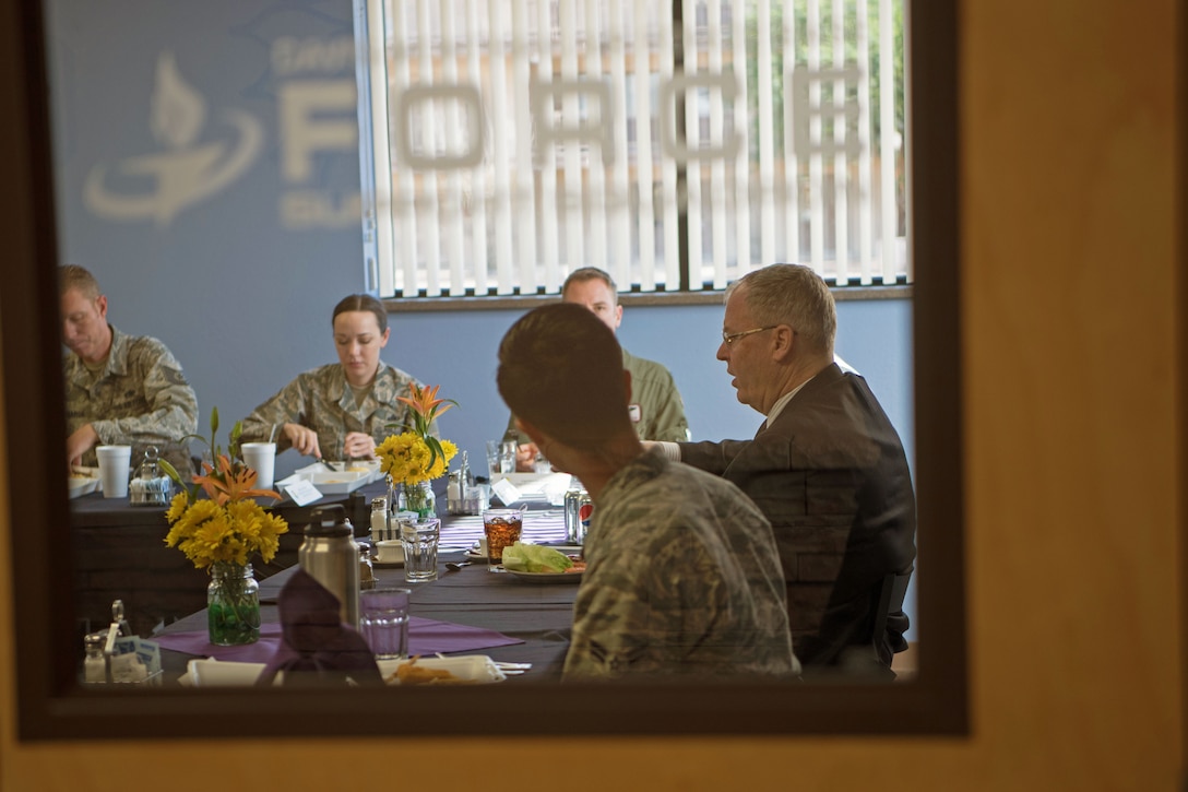 Deputy Defense Secretary Bob Work speaks with Air Force officers and enlisted personnel during lunch at Davis-Monthan Air Force Base, Tucson, Ariz., Dec. 2, 2016. DoD photo by Army Sgt. Amber I. Smith