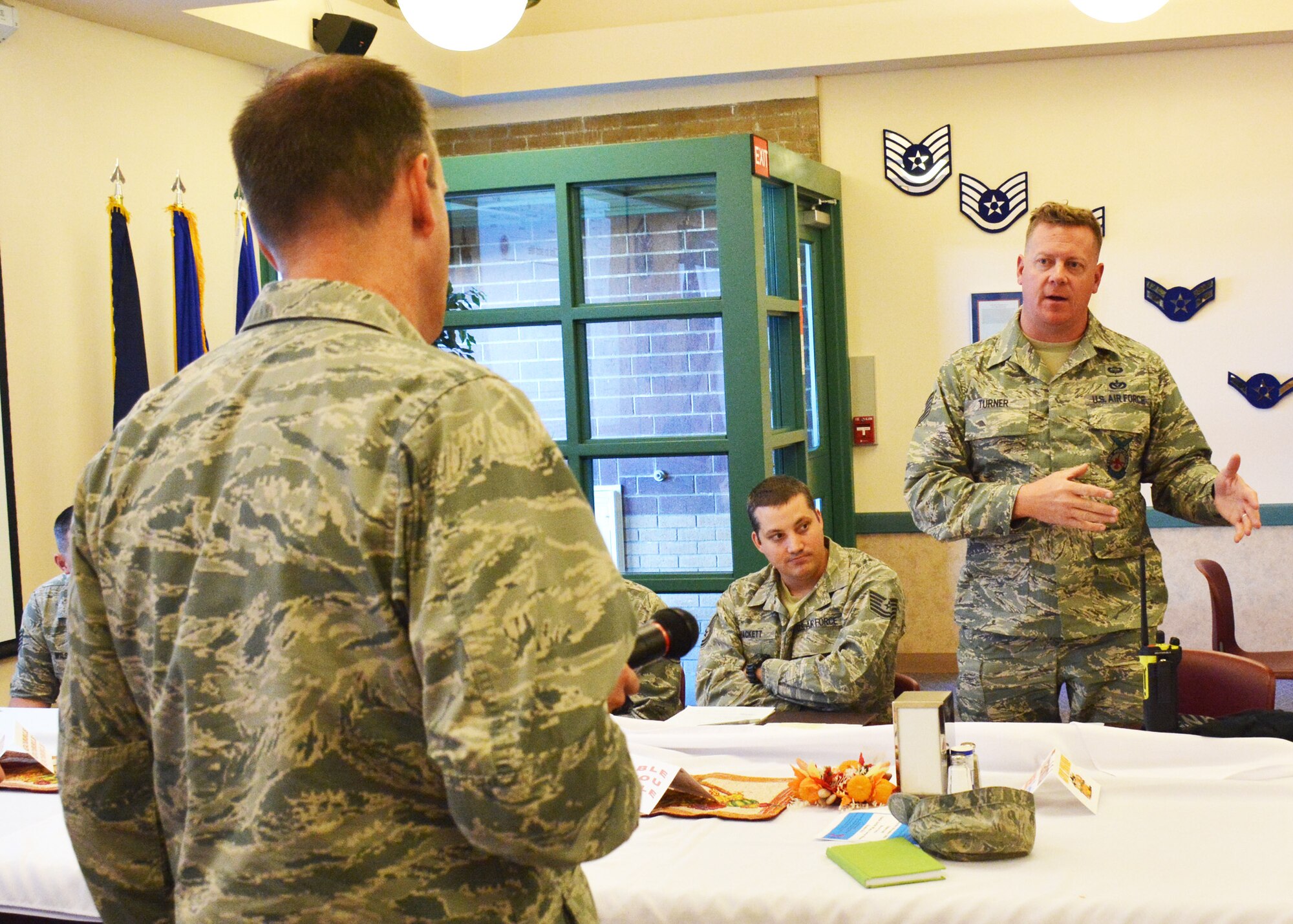 120th Airlift Commander Col. Lee Smith takes a question on awards and decorations from Tech. Sgt. Lance Turner during his lunch and learn event for Airmen held in the 120th AW Dining Facility on the base in Great Falls, Mont. November 6, 2016. (U.S. Air National Guard photo by Senior Master Sgt. Eric Peterson)