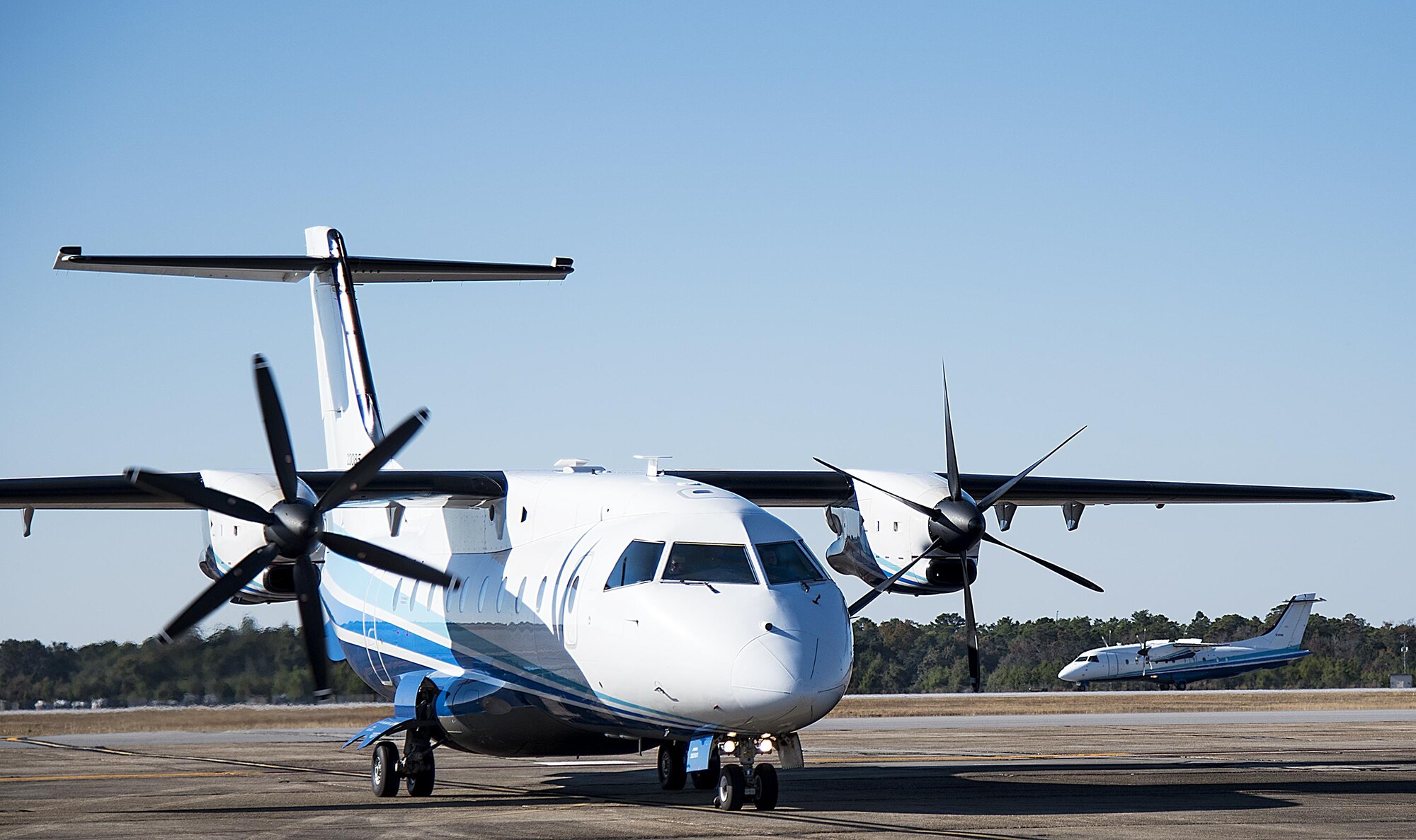 C-146A Wolfhounds carrying Secretary of Defense Ash Carter and his entourage taxi in for a visit at Eglin Air Force Base, Fla.  Carter traveled in the nonstandard aviation aircraft from Hurlburt Field, where he encountered various Air Force Special Operations missions.  The Wolfhounds are special operations aircraft stationed at Duke Field, Fla.  