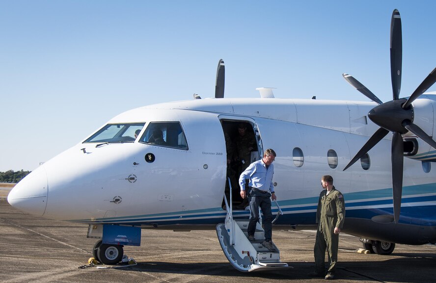 Secretary of Defense Ash Carter exits a C-146A Wolfhound for a visit at Eglin Air Force Base, Fla.  Carter traveled in the nonstandard aviation aircraft from Hurlburt Field, where he encountered various Air Force Special Operations missions.  The Wolfhounds are special operations aircraft stationed at Duke Field, Fla.  