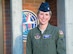 Maj. Judy Coyle, 728th Airlift Squadron C-17 pilot, poses for a photo in front of her squadron Dec. 12, 2016. Coyle, who balances fitness with two flying jobs, won first place in the Armed Forces Triathlon against all branches of the U.S. military and Canada in June 2016. (U.S. Air Force Reserve photo by Staff Sgt. Madelyn McCullough)