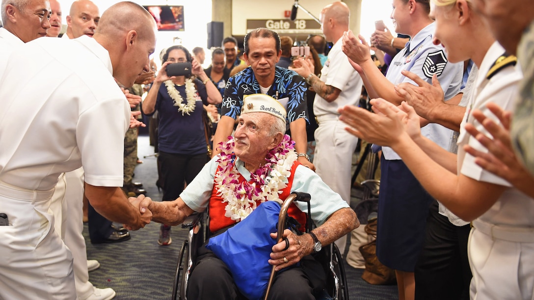 <strong>Photo of the Day: Dec. 5, 2016</strong><br/><br />Service members greet World War II veterans and Pearl Harbor survivors as they arrive to mark the 75th anniversary of the attacks in Honolulu, Dec. 3, 2016. Navy photo by Petty Officer 1st Class Nardel Gervacio<br/><br /><a href="http://www.defense.gov/Media/Photo-Gallery?igcategory=Photo%20of%20the%20Day"> Click here to see more Photos of the Day. </a>