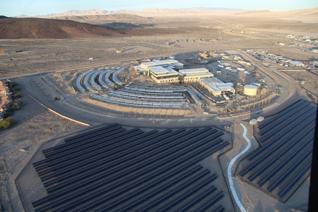 Construction of the new Fort Irwin Weed Army Community Hospital at Fort Irwin, California, is more than 80 precent completed.  A 7.6 acre  photovoltaic (PV) array and a solar thermal array, will generate 2.4 megawatts of power and the solar thermal array will provide a majority of the hot water the hospital requires. 
The new hospital project consists of a 216,000 square foot hospital facility which will provide Soldier and family patient care, emergency medicine, and a wide variety of clinical support. Additionally, the project includes a 9,000-square-foot renovation of the Mary E. Walker Center and construction of a helipad, ambulance shelter, and central utilities plant. The facility stands to become the first LEED Platinum,  net-zero, carbon-neutral hospital that will generate all of its energy needs from solar power and renewable energy systems.
