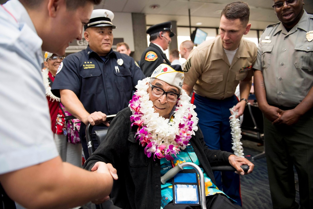 Ray Chavez, 104, the oldest living Pearl Harbor survivor, arrives in Honolulu, Dec. 3, 2016. More than 100 World War II veterans, including Pearl Harbor survivors, arrived in Honolulu to participate in Pearl Harbor 75th anniversary remembrance events. Navy photo by Petty Officer 1st Class Nardel Gervacio