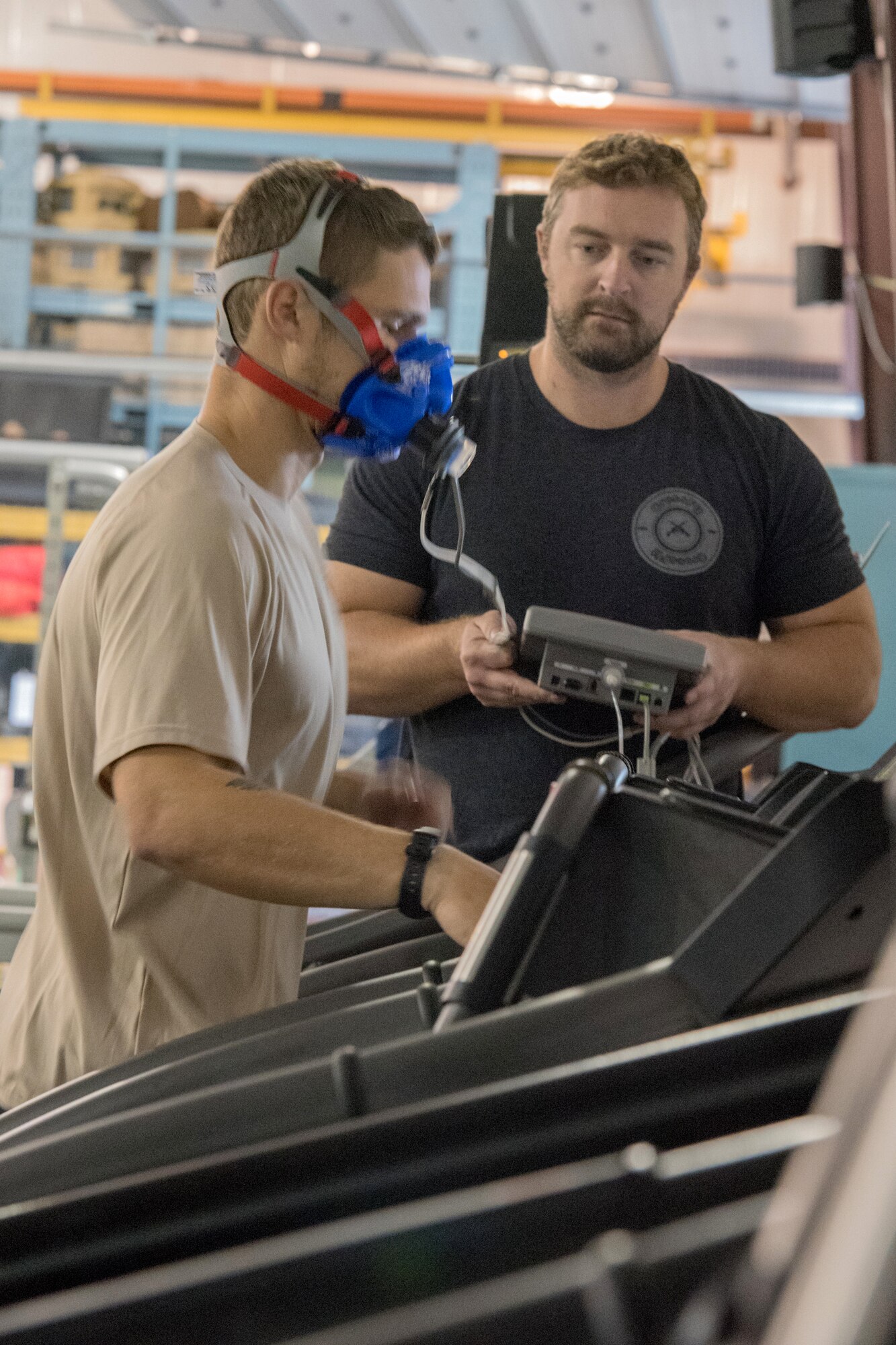 Will Lawson, lead athletic trainer and strength coach for the 123rd Special Tactics Squadron’s Human Performance Program, measures the maximal oxygen uptake of Staff Sgt. Robert Willging, a special tactics operator, during a routine evaluation at the Kentucky Air National Guard Base in Louisville, Ky., Oct. 14, 2016. Lawson is one of three trained professionals at the base who provide special operators with a multifaceted approach to strength, conditioning, injury prevention and rehabilitation. (U.S. Air National Guard photo by Tech. Sgt. Vicky Spesard)
