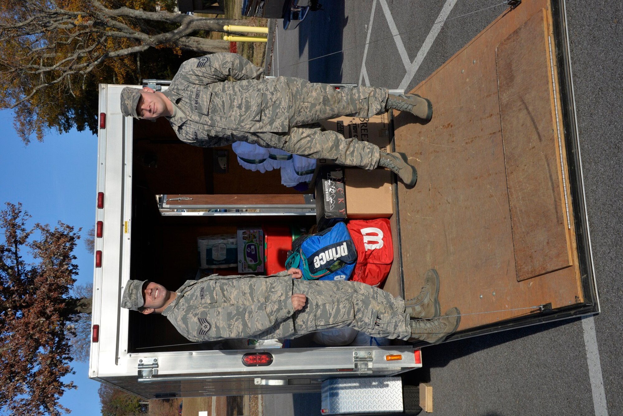 Staff Sgt. Charlie Dunkelberger and Staff Sgt. Logan Shamblin, crew chiefs in the 134th Air Refueling Wing, stepped in to assist with the relief effort following the devastating wild fires that struck Gatlinburg, TN, Dec. 2, 2016 at McGhee Tyson ANGB. (U.S. Air National Guard Photo by Staff Sgt. Ben Mellon)