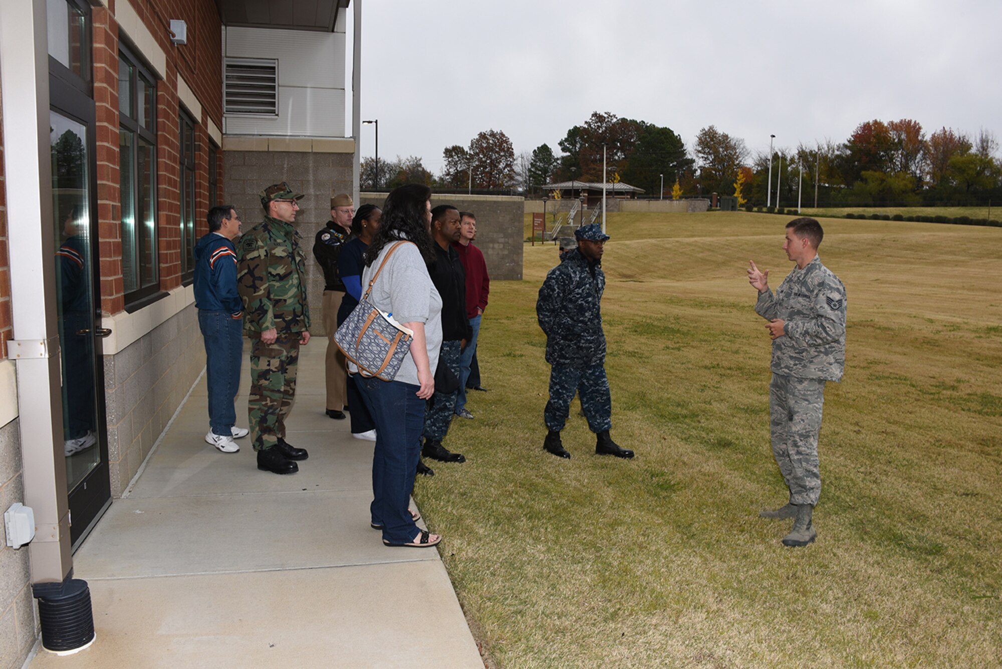 The Parents and mentors of the Sea Cadets Corps stationed in the Millington Naval Support Activity-Mid South Speak with SSgt. David Wilbur about the Radio Frequency antennas in use at the 164th Airlift Wing in Memphis, TN Dec.3, 2016