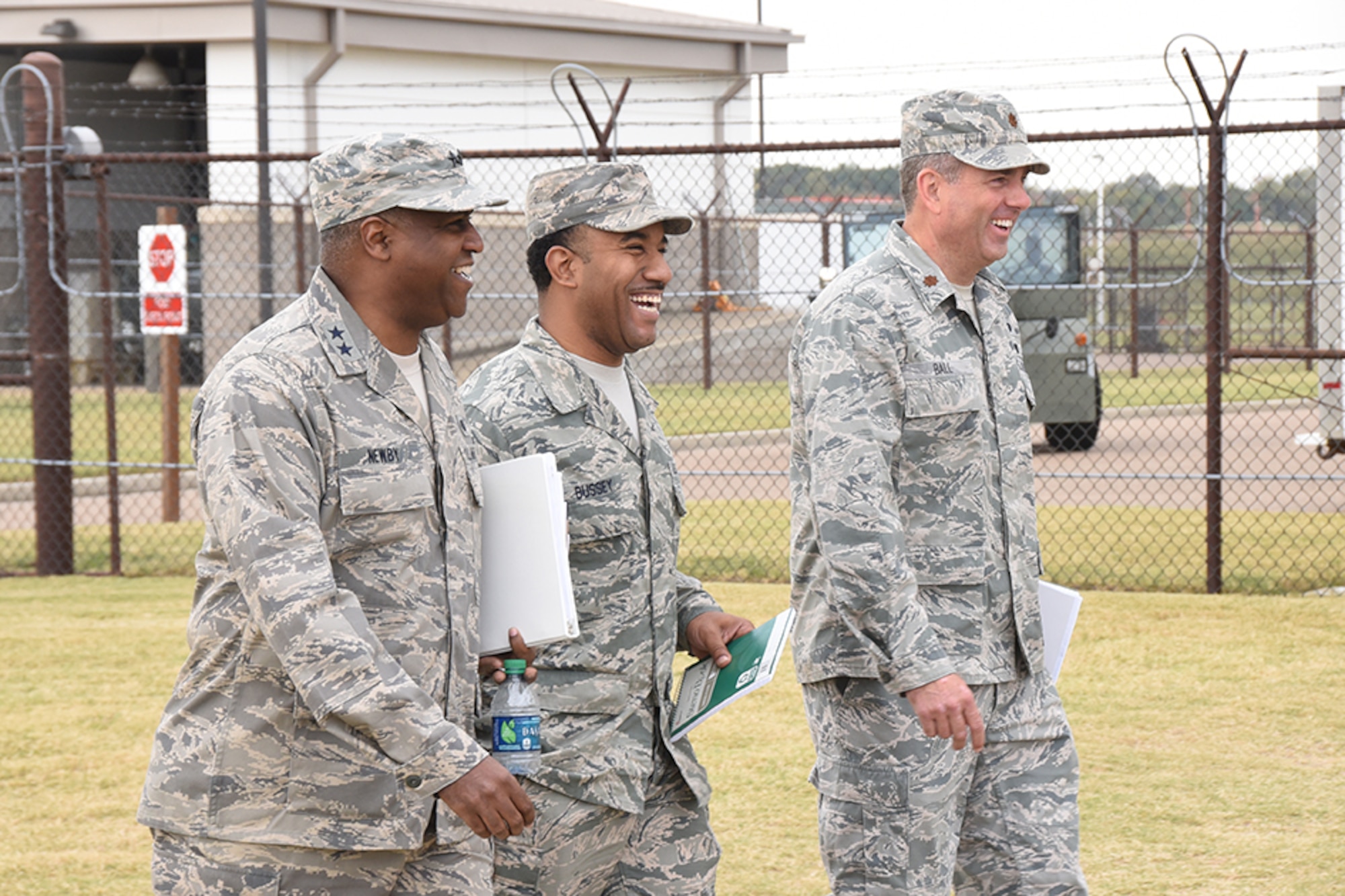 Major General Brian Newby Walks with SrA Leon Bussey and Major Bradley Ball at the 164th Airlift Wing in Memphis, TN Nov. 5 2016. Maj. Gen.  Newby  visited the 164th Airlift Wing to check on how the JAG office is Performing.