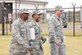 Major General Brian Newby Walks with SrA Leon Bussey and Major Bradley Ball at the 164th Airlift Wing in Memphis, TN Nov. 5 2016. Maj. Gen.  Newby  visited the 164th Airlift Wing to check on how the JAG office is Performing.
