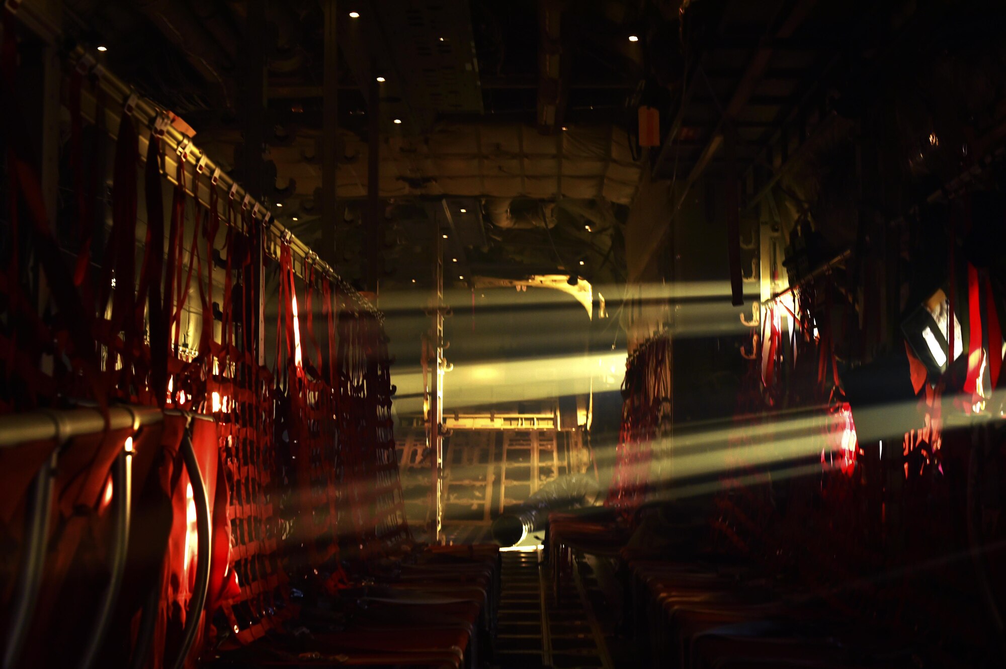 Rays of morning light shine into the belly of a C-130J Super Hercules at Ramstein Air Base, Germany, Nov. 30, 2016. The aircraft and aircrew transported more than 50 NATO service members to a drop zone northeast of here as part of International Jump Week training. (U.S. Air Force photo by Senior Airman Jonathan Bass)