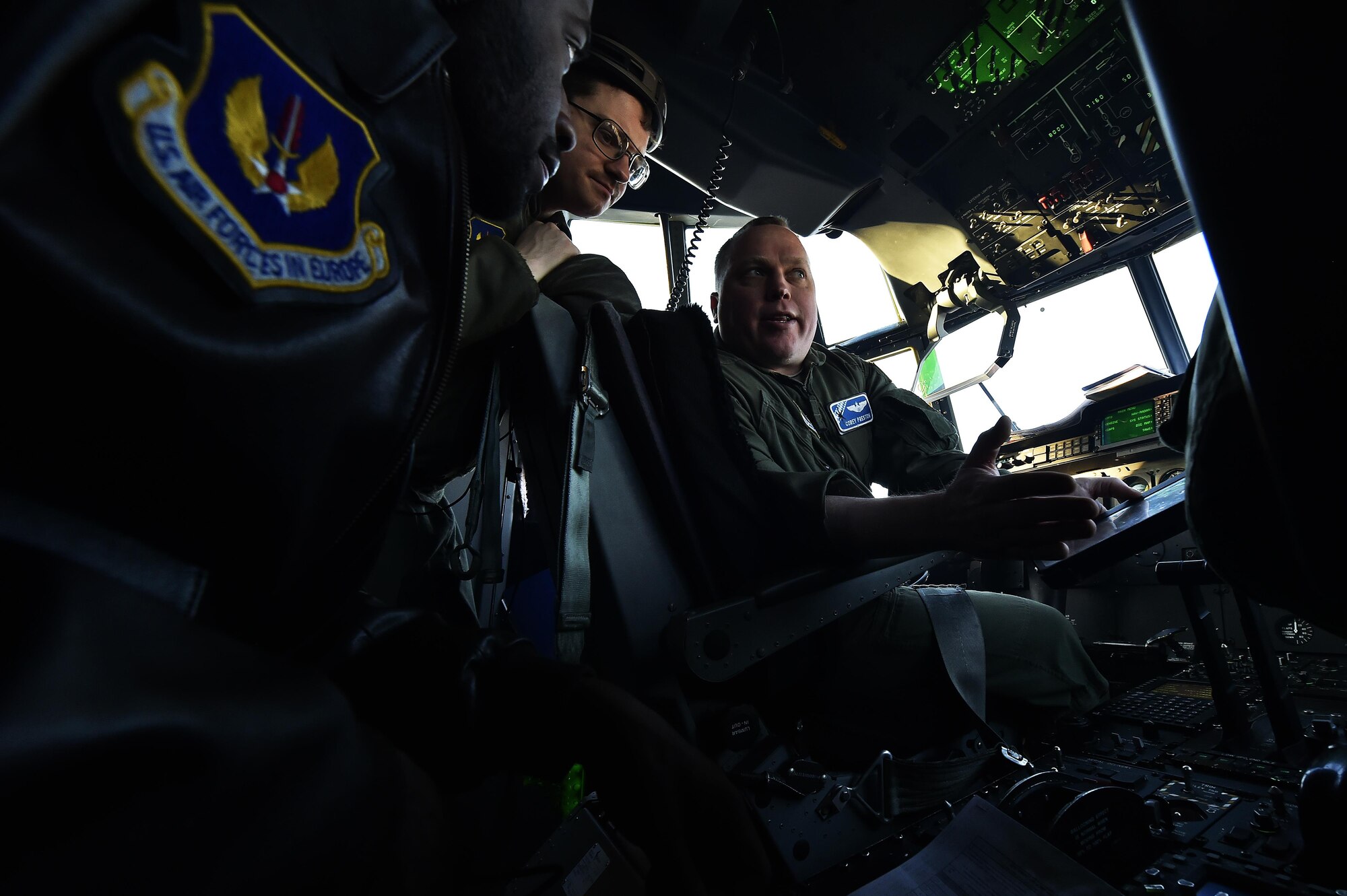 U.S. Air Force Maj. Corey Preston, 37th Airlift Squadron assistant director of operations, briefs his crew prior to flying as part of a two-ship mission to air drop NATO service members northeast of Ramstein Air Base, Germany, Nov. 30, 2016. Preston and his crew carried more than 50 jumpers in minus 6 degrees Celsius temperatures to the drop zone. (U.S. Air Force photo by Senior Airman Jonathan Bass)