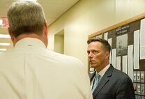 Todd Weiler, Assistant Secretary of Defense for Manpower and Reserve Affairs, listens to Dr. Timothy McMahon, Chief of Forensic Services for the Armed Forces DNA Identification Laboratory, explain the different types of identification procedures used to identify remains recovered from the USS Oklahoma (BB 37) and processed by the AFDIL Nov. 4, 2016, at AFMES on Dover Air Force Base, Del. The AFDIL, a subdivision of AFMES, is the sole Department of Defense DNA laboratory tasked with identifying human remains from current and past conflicts. (U.S. Air Force photo by Roland Balik)