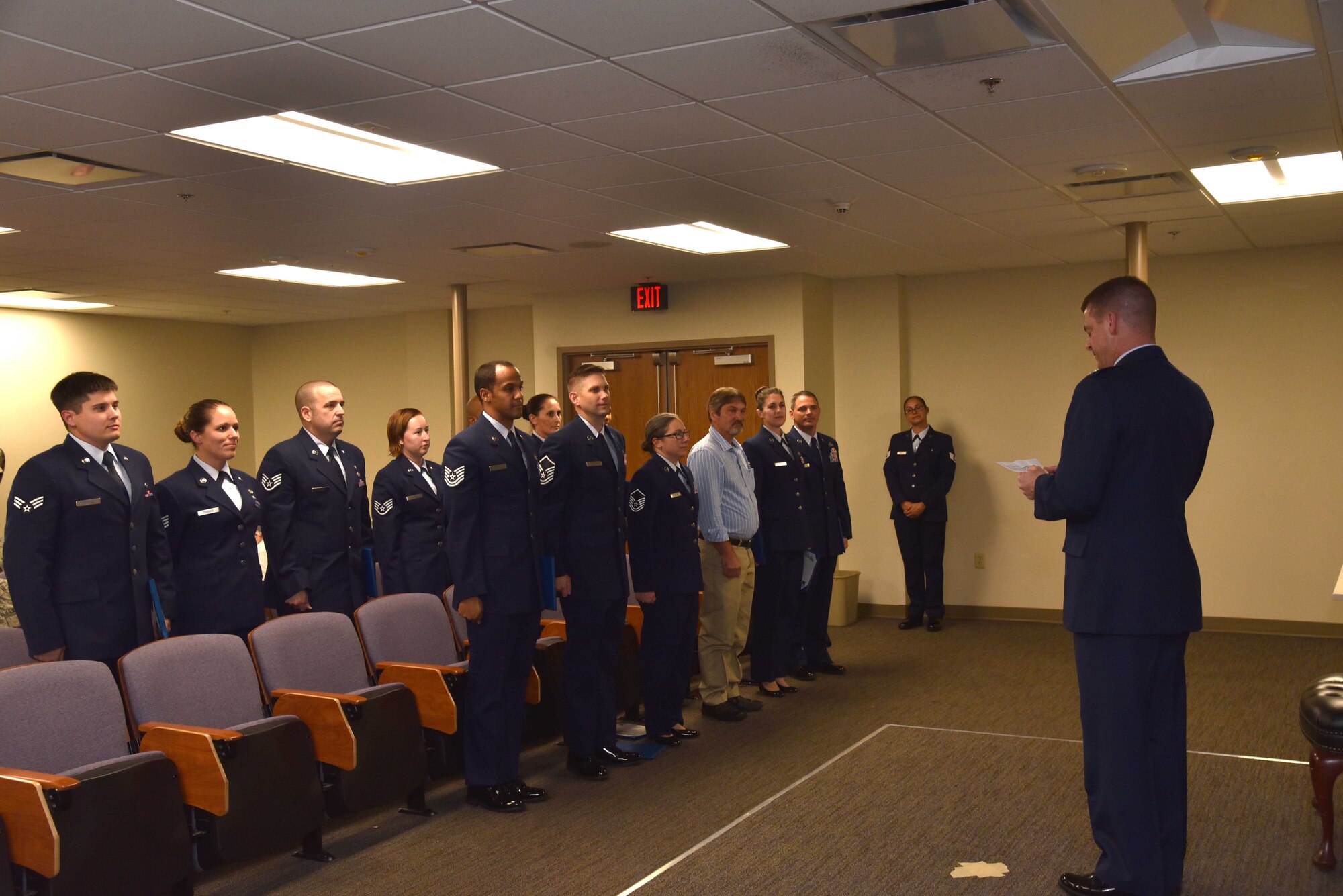 Colonel Frank Amodeo 927th Air Refueling Wing Commander reads the commencement address to recent Community College of the Air Force graduates during the December UTA at MacDill Air Force Base, FL. Each year, CCAF students earn more than 1.6 million hours of college credits, and the college has awarded more than 335,000 degrees since 1977. (U.S. Air Force Photo by Senior Airman Xavier Lockley)