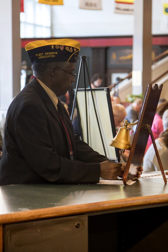Retired Navy Chief Petty Officer Terry Ellis rings a bell salute in remembrance of service members lost during the Pearl Harbor remembrance ceremony at the National Museum of the Mighty Eighth Air Force in Pooler, Georgia, Dec, 4, 2016. Army photo by Sgt. Kellen Stuart