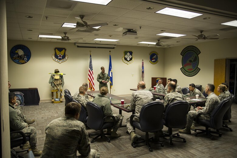 Lt. Col. John Robinson, 315th Operations Group commander, speaks to Reservists of 4th Combat Camera Squadron during the 315th Airlift Wing's December unit training assembly. The 4th Combat Camera Squadron and its Airmen found a new home this weekend with the 315th Airlift Wing at Joint Base Charleston. The 4th CTCS, which was formally assigned to March Air Reserve Base in Riverside, Calif., deactivated in July 2015, but was reactivated and relocated to the 315 AW due to mission need. (U.S. Air Force Photo by Senior Airman Jonathan Lane)