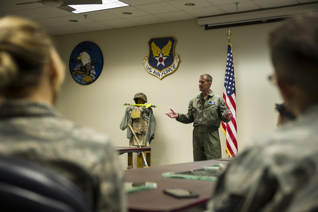 Lt. Col. John Robinson, 315th Operations Group commander speaks to Reservists of 4th Combat Camera Squadron during the 315th Airlift Wing's December unit training assembly. The 4th Combat Camera Squadron and its Airmen found a new home this weekend with the 315th Airlift Wing at Joint Base Charleston. The 4th CTCS, which was formally assigned to March Air Reserve Base in Riverside, Calif., deactivated in July 2015, but was reactivated and relocated to the 315 AW due to mission need. (U.S. Air Force Photo by Senior Airman Jonathan Lane)