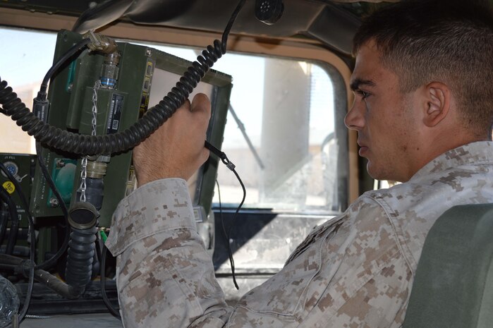Cpl. Kyle Denny with 3rd Light Armor Reconnaissance, 1st Marine Division, from Twentynine Palms, Calif., does a system check on a Joint Battle Command-Platform during Network Integration Evaluation 14.1 in November 2013 at McGregor Range, N.M. JBC-P is an Army-Marine Corps program that enhances command and control, and situational awareness. Marine Corps Systems Command has fielded nearly 1,100 of the systems to several vehicle platforms since July. (U.S. Marine Corps photo by Staff Sgt. Candice Harrison)