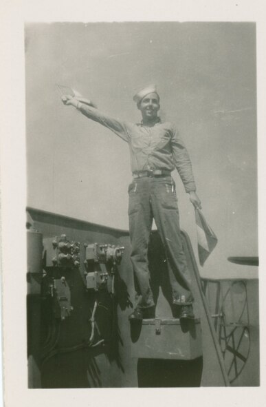 Del Garforth signals from his post aboard the LSM-143, or Landing Ship Medium, on which he served during WWII. Ray McCoy, who works at AEDC, recently wrote a book, General Quarters!, recounting Garforth’s time in the U.S. Navy as a lead signalman on the LSM-143. (Courtesy photo)