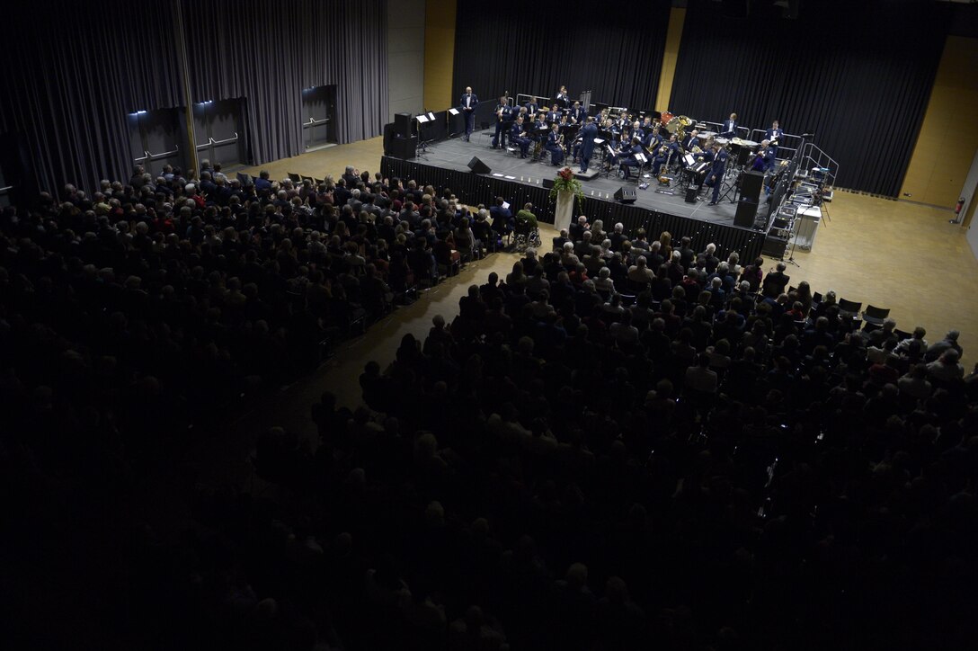 The U.S. Air Forces in Europe Concert band plays a holiday celebration at City Hall, Bitburg, Germany, Dec. 3, 2016. The band played holiday songs as a way to say thank you to the community members who support USAFE installations. (U.S. Air Force photo by Staff Sgt. Jonathan Snyder)