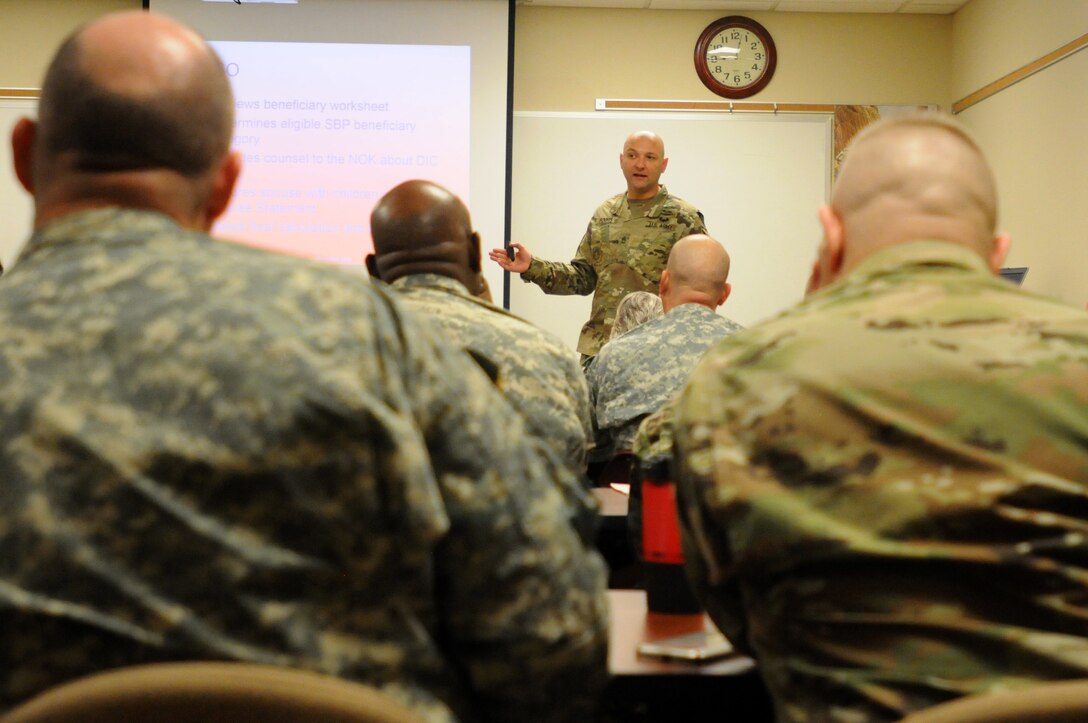 FORT McCOY, Wisconsin (December 2, 2016) – Sgt. 1st Class David Boots, standing, the lead Casualty Notification/Casualty Assistance Officer trainer for the 88th Regional Support Command, talks to a class of 30 Soldiers about the duties of a casualty assistance officer during a three-day training session at Fort McCoy, Wisconsin, November 30, 2016. The class certifies Casualty Notification and Casualty Assistance Officers across the 19-state region of the 88th RSC to conduct the duties of notifying and assisting families of deceased Soldiers.