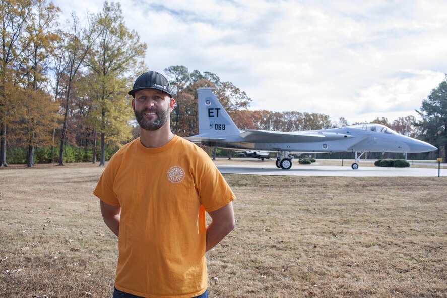 AEDC outside machinist Eric Brumley, pictured in front of the AEDC main gate entrance, will retire from the Air National Guard Jan. 4, 2017. (U.S. Air Force photo/Jacqueline Cowan)