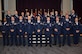 Twenty-one Air Force Reserve Airmen from the 920th Rescue Wing, Patrick Air Force Base, Florida, received their Associate of Applied Science degrees from the Community College of the Air Force Dec. 4 during a ceremony at the Defense Equal Opportunity Management Institute here. 
During the ceremony, Col. Brett Howard, the 920th RQW vice wing commander, presented the diplomas while 920th RQW Command Chief Timothy Bianchi presented special coins to each graduate.
