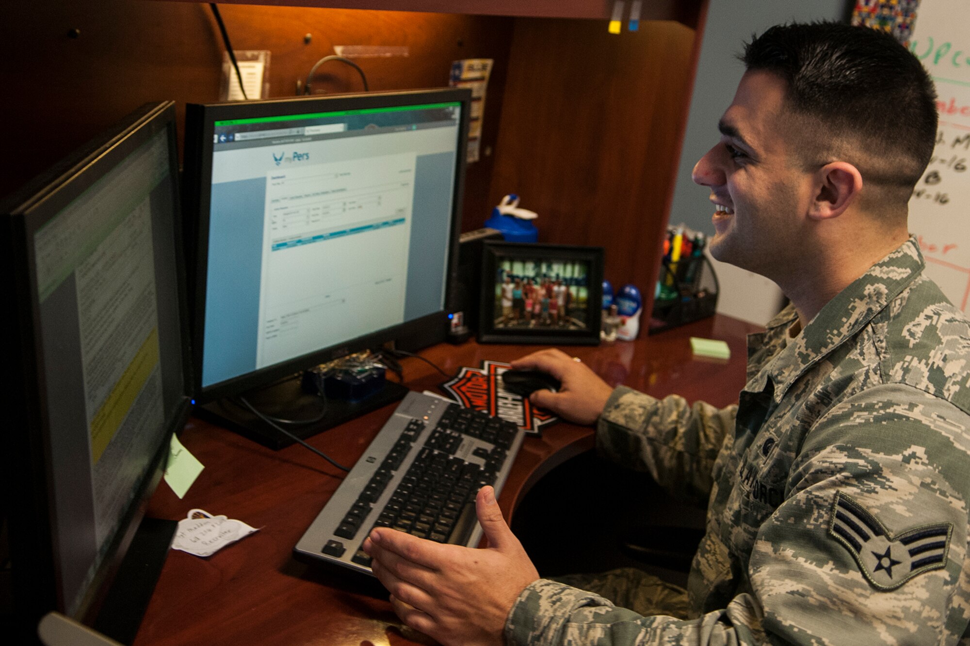 Senior Airman Matt Kaim, 434th Force Support Squadron evaluations program manager, reviews the changes to the Air Force Instruction which covers officer and enlisted evaluations. The yearly evaluations can affect promotions and eligibility to attend in-residence professional military education courses. (U.S. Air Force photo/Staff Sgt. Dakota Bergl)