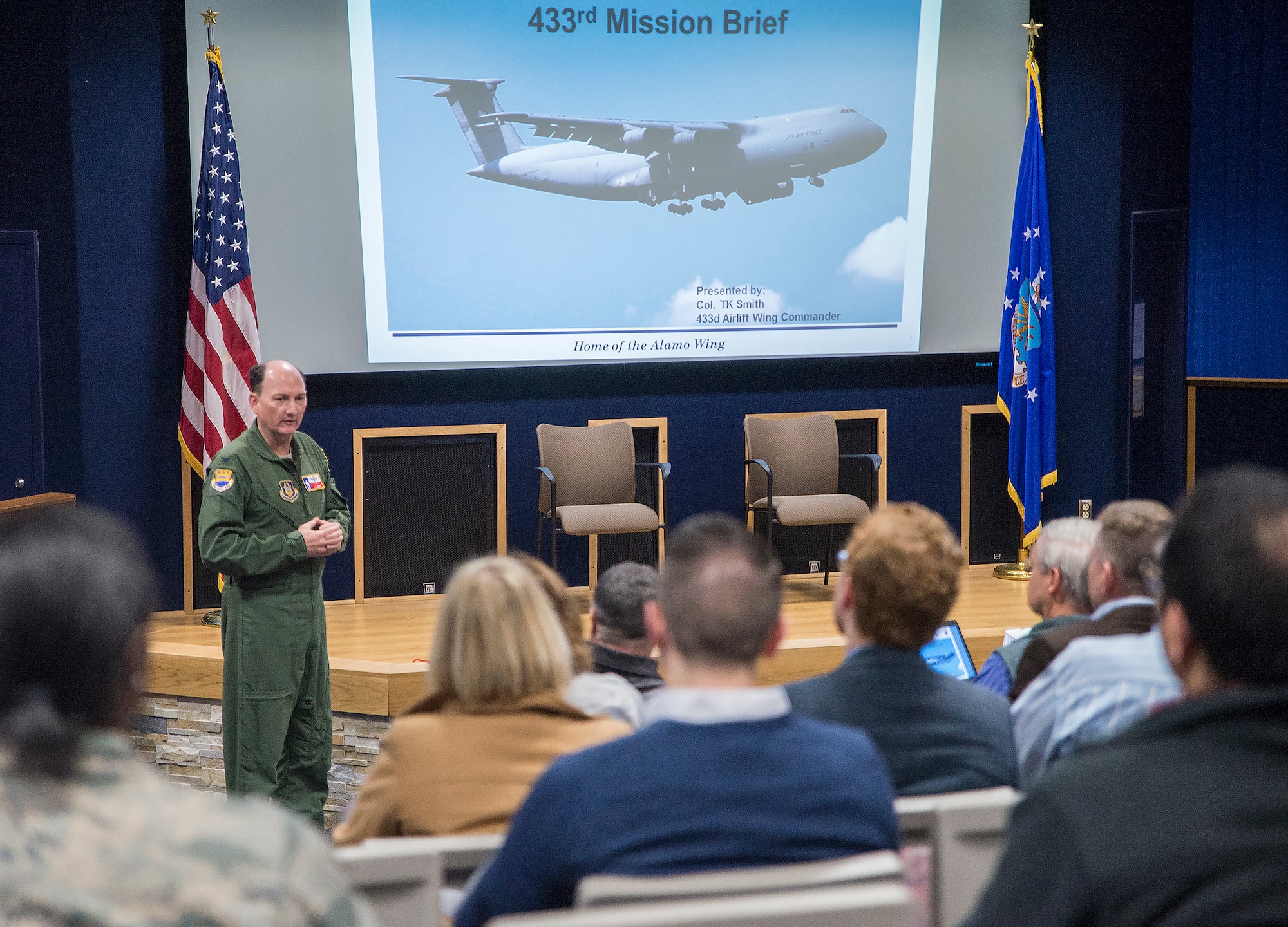 Col. Thomas K. Smith, Jr., 433rd Airlift Wing commander, gives the wing’s mission brief to nearly 30 civic leaders from Joint Base McGuire-Dix-Lakehurst, New Jersey Nov. 30, 2016 at Joint Base San Antonio-Lackland, Texas. The civic leaders also toured a C-5M Super Galaxy aircraft, the Medical Training, and Education Campus at JBSA-Ft. Sam Houston, and the Center for the Intrepid. (U.S. Air Force photo by Benjamin Fiske)