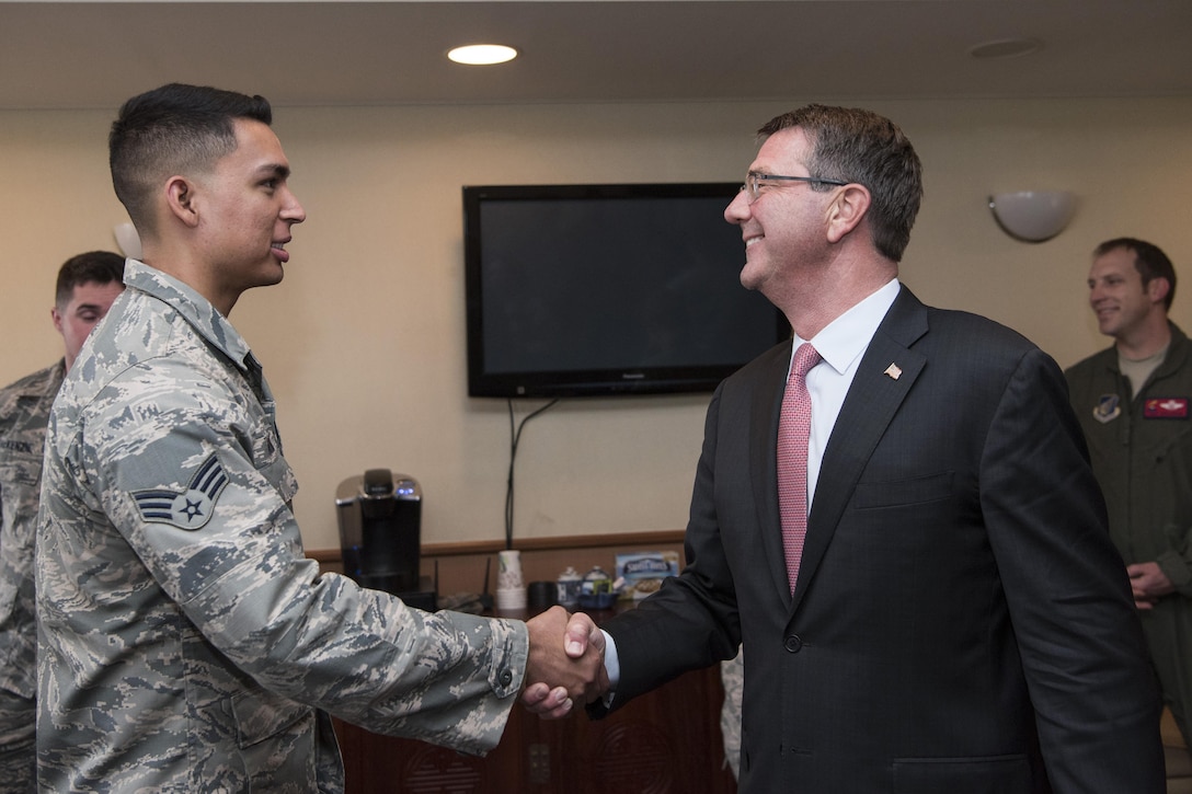 Defense Secretary Ash Carter meets with troops after arriving at Yokota Air Base, Japan, Dec. 5, 2016. DoD photo by Air Force Tech. Sgt. Brigitte N. Brantley