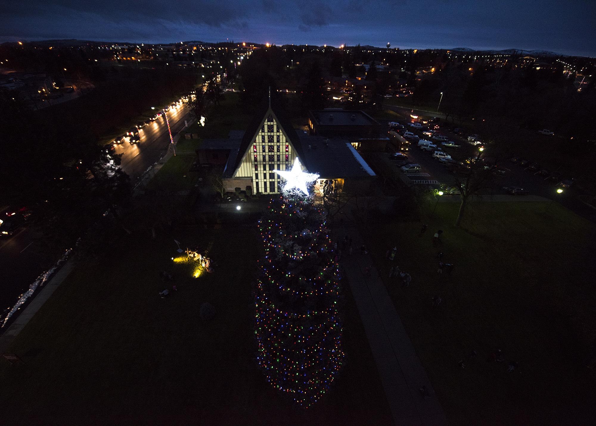 An aerial view of the Fairchild Holiday Tree after the Dec. 2, 2016, ceremony at Fairchild Air Force Base, Wash. Airmen from the 92nd Civil Engineer Squadron used basket lifts to decorate the tree with hundreds of lights and a star for the annual Fairchild Holiday Tree Lighting Ceremony. (U.S. Air Force photo/Airman 1st Class Ryan Lackey)
