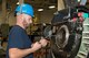 Gordon Lowtharp, a jet engine mechanic at the Air Force Reserve Command (AFRC) T-56 Centralized Repair Facility, removes a pump from a Hamilton Standard propeller, Dec. 1, 2016, at Little Rock Air Force Base, Ark. The facility produces all Legacy C-130 engine and propeller overhaul repairs for AFRC, saving millions of taxpayer dollars each year by repairing certain items rather than replacing them. (U.S. Air Force photo by Master Sgt. Jeff Walston/Released)