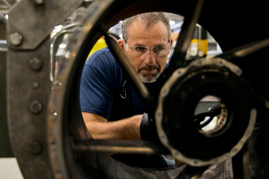 Ervin Riddle, a jet engine mechanic at the Air Force Reserve Command (AFRC) T-56 Centralized Repair Facility, tears down a turbine bearing support for inspection, Nov. 2, 2106, at Little Rock Air Force Base, Ark. The facility produces all Legacy C-130 engine and propeller overhaul repairs for AFRC and many Air National Guard units. (U.S. Air Force photo by Master Sgt. Jeff Walston/Released)