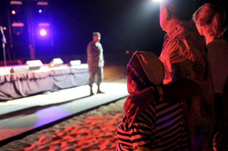 Brig. Gen. Chris Hill, the Pacific Air Forces Director of Logistics, Engineering and Force Protection, provides opening remarks at Sunset on the Beach's Air Force Night Dec. 2, 2016, at Waikiki Beach, Hawaii. The movie night featured the Air Force-themed movie "Twelve O'Clock High," and was part of a week's-long schedule of events for the 75th Commemoration of the Attack on Pearl Harbor and Oahu. (U.S. Air Force photo by Staff Sgt. Alexander Martinez)
