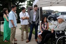 Members of Sgt. James Strickland's family visit with Durward Swanson (right) during the dedication ceremony of Strickland's memorial marker Dec. 4, 2016, at Joint Base Pearl Harbor-Hickam, Hawaii. Strickland was killed near the memorial marker by Japanese gunfire during the attack on Pearl Harbor and Oahu Dec. 7, 1941. Swanson was with Strickland during his final moments, and has visited his grave at the National Memorial Cemetery of the Pacific for the past 10 years. (U.S. Air Force photo by Staff Sgt. Alexander Martinez)