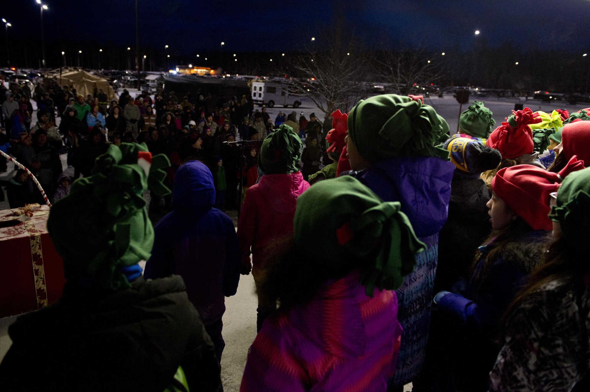 The Ursa Major Elementary School choir sings Christmas songs during the annual Joint Base Elmendorf-Richardson Holiday Tree Lighting in front of the Joint Military Mall, adjacent to the Commissary, Dec. 1, 2016. 