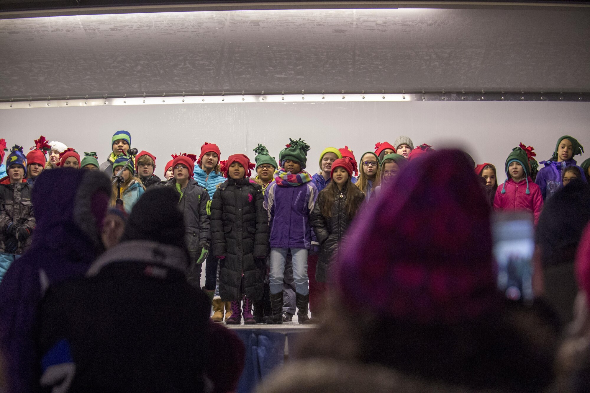 The Ursa Major Elementary School choir sings Christmas songs during the annual Joint Base Elmendorf-Richardson Holiday Tree Lighting in front of the Joint Military Mall, adjacent to the Commissary, Dec. 1, 2016. 