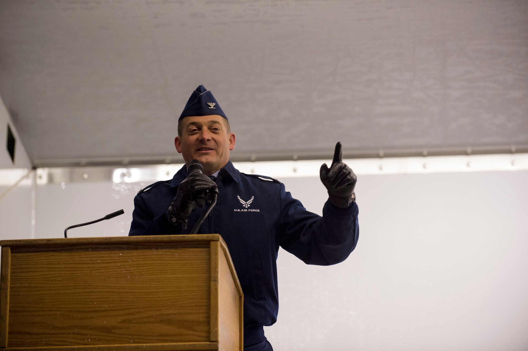 Air Force Col. George Dietrich, Joint Base Elmendorf-Richardson and 673d Air Base Wing commander, speaks to the audience during the JBER Holiday Tree Lighting ceremony, Dec. 1, 2016. The annual event brings service members, families, and wing leadership together to begin the holiday season. 