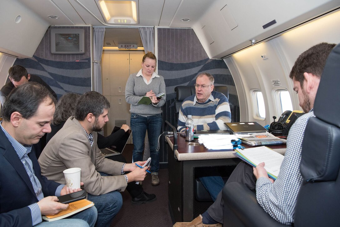 Deputy Defense Secretary Bob Work speaks with reporters during a return flight to Joint Base Andrews, Md., Dec. 4, 2016. DoD photo by Army Sgt. Amber I. Smith