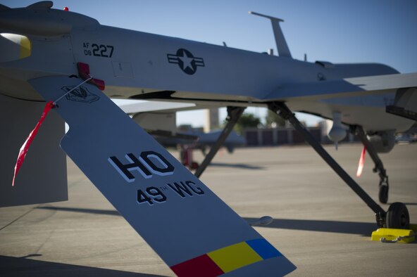 An MQ-1 Predator sits on the flight line of Holloman Air Force Base, N.M., Aug. 19, prior to maintenance that will keep it flying and training the next generation of Air Force pilots and sensor operators. The MQ-1 is a medium-altitude, long-endurance, unmanned aircraft system. The MQ-1's primary mission is interdiction and conducting armed reconnaissance against critical, perishable targets. When the MQ-1 is not actively pursuing its primary mission, it acts as the Joint Forces Air Component Commander-owned theater asset for reconnaissance, surveillance and target acquisition in support of the Joint Forces commander.(U.S. Air Force photo by Airman 1st Class Aaron Montoya)