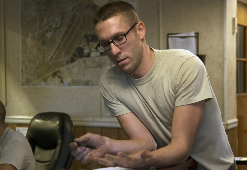 U.S. Air Force Staff Sgt. Cody McDonald, 20th Logistics Readiness Squadron vehicle maintenance journeyman, counts inspection items listed on Air Force form 4355, “Vehicle Incoming Inspection,” at Shaw Air Force Base, S.C., Dec. 1, 2016. Vehicle maintenance Airmen use the checklist to complete thorough vehicle inspections, guaranteeing the safety of vehicle occupants. (U.S. Air Force photo by Airman 1st Class Kathryn R.C. Reaves)
