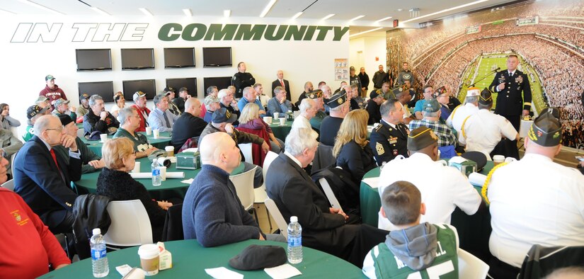 Maj. Gen. Troy D. Kok, commanding general of the U.S. Army Reserve’s 99th Regional Support Command headquartered at Joint Base McGuire-Dix-Lakehurst, New Jersey, addresses roughly 100 Vietnam Veterans during an appreciation event hosted Dec. 4 by the National Football League’s New York Jets.