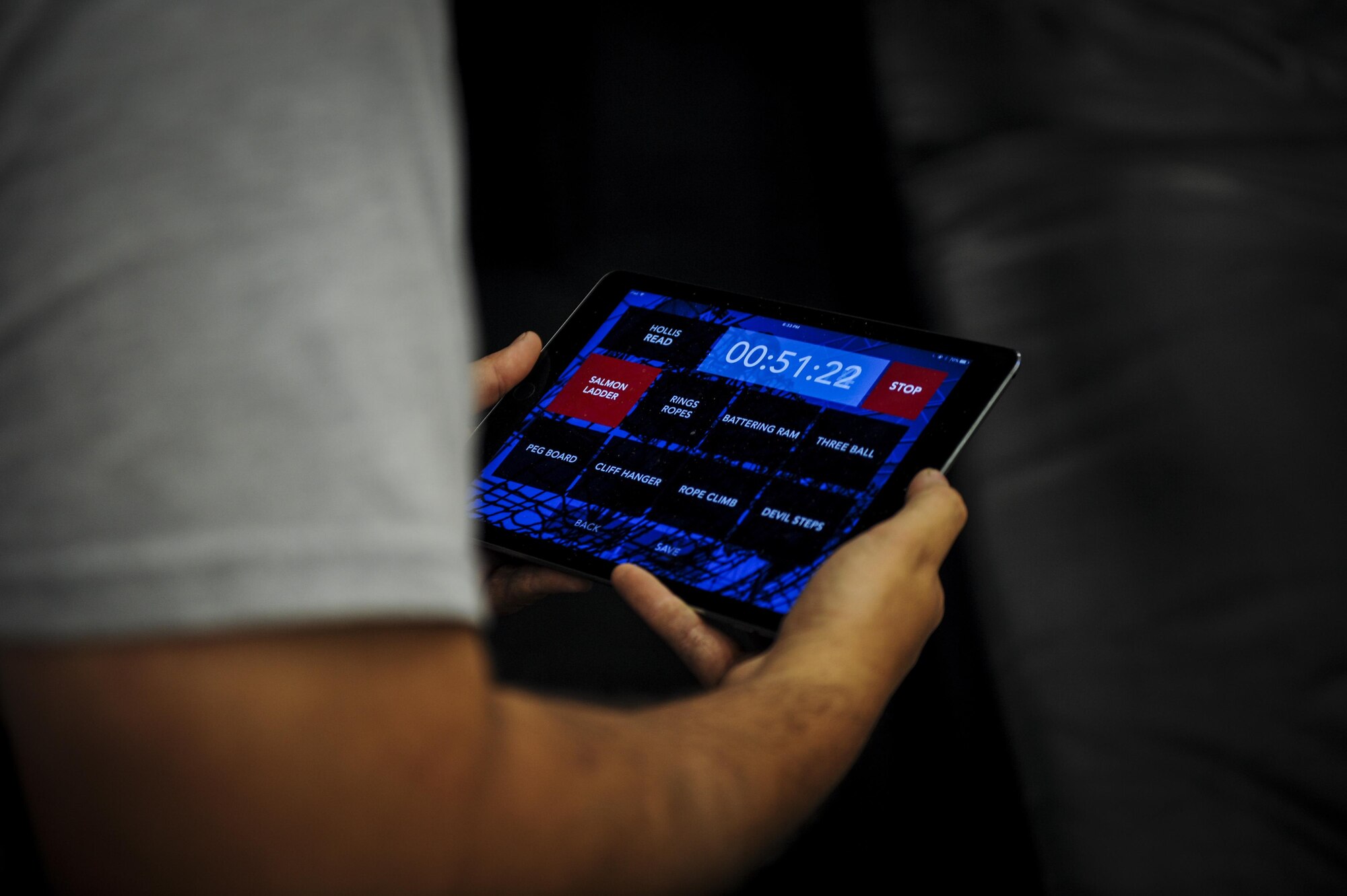 A judge of the Alpha Warrior competition keeps track of competitors’ rankings during Alpha Warrior competition at Hurlburt Field, Fla., Dec. 3, 2016. This was the first Alpha Warrior Competition held on Hurlburt. This competition is a timed obstacle course designed to push participants to their mental and physical limits. (U.S. Air Force photo by Airman Dennis Spain)