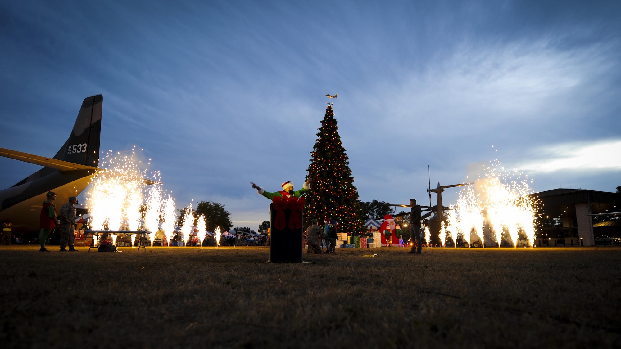 Team Hurlburt held a Christmas tree lighting ceremony at Hurlburt Field, Fla., Dec. 2, 2016. In addition to the tree lighting, Air Commandos and families celebrated the holiday season by pinning yellow ribbons on a wreath and receiving a visit from Santa Claus. (U.S. Air Force photo by Airman Dennis Spain)