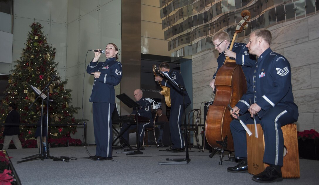 The U.S. Air Force Band’s Airmen of Note performs at the National Museum of American History in Washington, D.C., Dec. 3, 2016. The group of five played their combination of holiday classics titled “High Flight” over a two-day period for museum visitors. (U.S. Air Force photo by Senior Airman Jordyn Fetter)