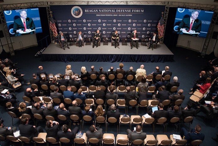 Deputy Defense Secretary Bob Work, second from right on stage, and other defense leaders participate in a panel discussion at the Reagan National Defense Forum in Simi Valley, Calif., Dec. 3, 2016. Joining Work on the panel, among others, were U.S. Pacific Command Commander Navy Adm. Harry B. Harris Jr., and Army Chief of Staff Gen. Mark A. Milley. David Feith of the Wall Street Journal moderated the panel.
