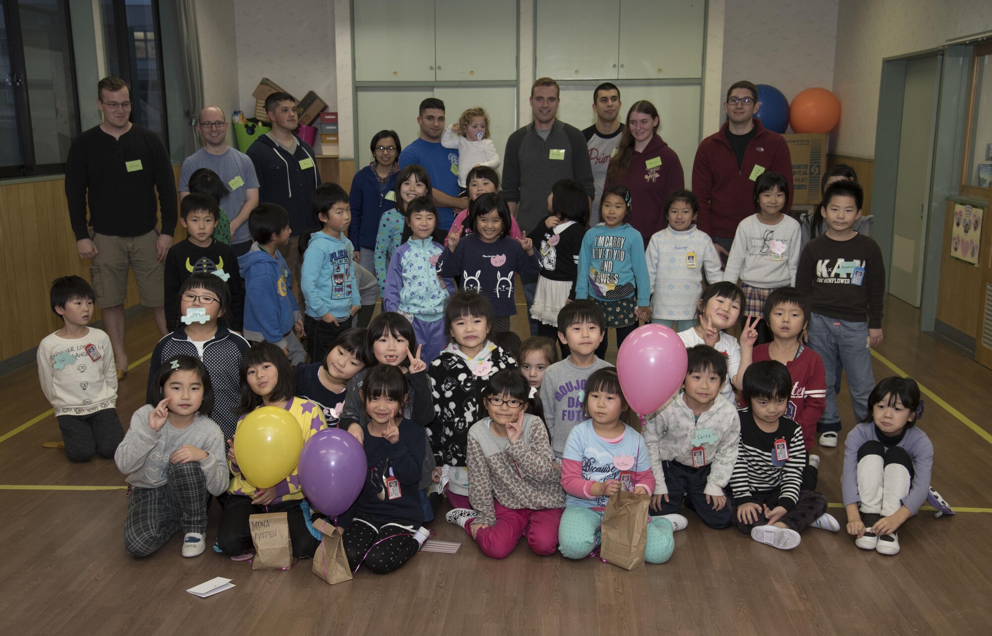 Airmen with the 35th Fighter Wing pose with their Jido-kan group at Okamisawa Grade SChool, Misawa City, Japan, Nov. 22, 2016. U.S. Air Force 2nd Lt. Jacob McGill, the 35th Civil Engineer Squadron program development chief, said the squadron plans to expand their program to many schools in the future for further community outreach. (U.S. Air Force photo by Airman 1st Class Sadie Colbert)