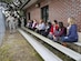 Tech. Sgt. Timothy Garrett, 628th Security Forces military working dog kennel master, left, explained the training process for the dogs to Joint Base Charleston spouses during a tour here Dec. 5, 2016. The spouses had the opportunity to visit several tour stops across the Air Base and learn about various mission sets.