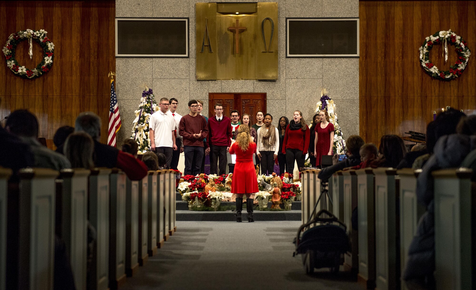 The Yokota High School Choir performs at a tree lighting ceremony at the main chapel at Yokota Air Base, Japan, Dec. 1, 2016. The tree lighting marks the official start of the holiday season at Yokota. (U.S. Air Force Photo by Airman 1st Class Juan E. Torres/Released)